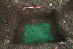 photo 0015: Test pit H, green marker artefacts added